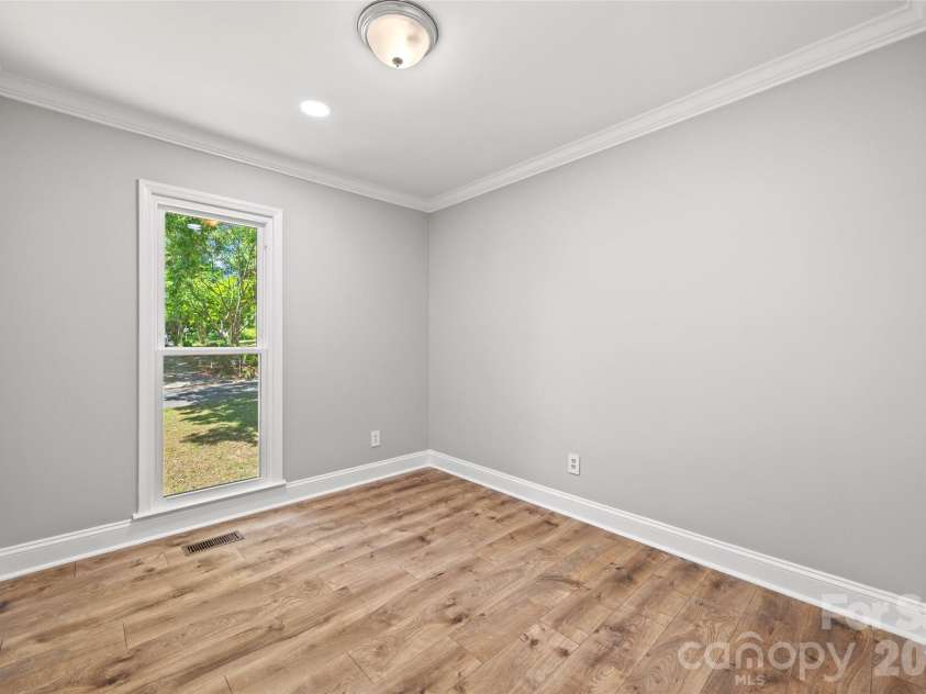 204 Swamp Fox Drive, Fort Mill, SC 29715.  MLS# CAR4368341, YatesRealty ID 22466. Bedroom #2 on main level