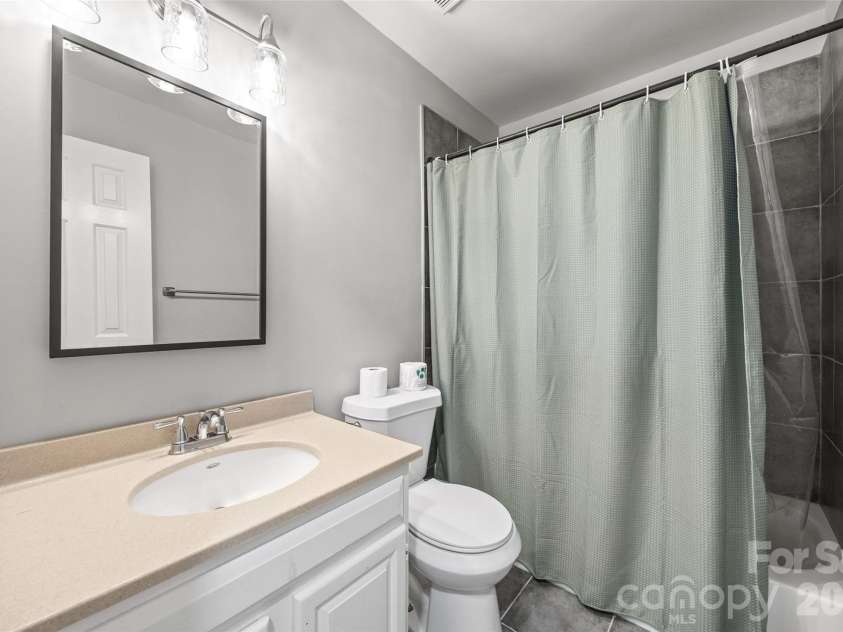 204 Swamp Fox Drive, Fort Mill, SC 29715.  MLS# CAR4368341, YatesRealty ID 22466. Hall bathroom on main level