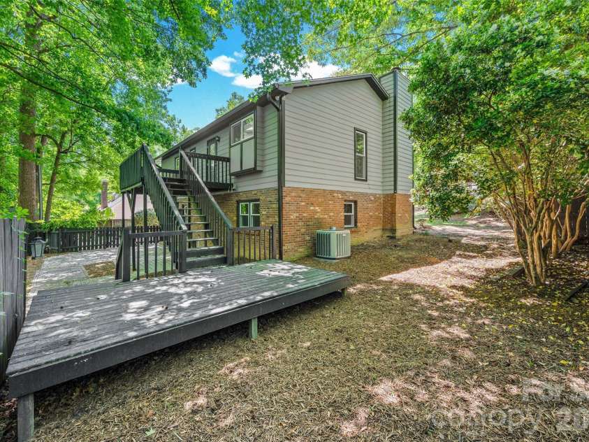 204 Swamp Fox Drive, Fort Mill, SC 29715.  MLS# CAR4368341, YatesRealty ID 22466. Private backyard