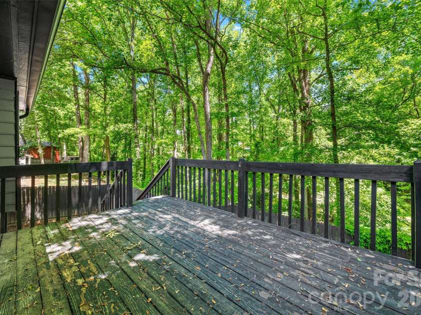 204 Swamp Fox Drive, Fort Mill, SC 29715.  MLS# CAR4368341, YatesRealty ID 22466. Private rear deck off main level