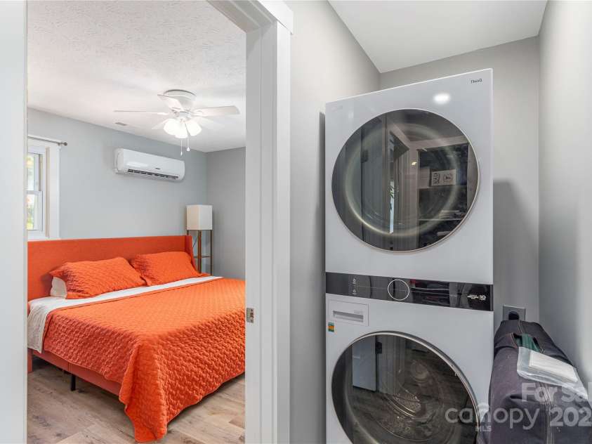 406 Melody Circle, Swannanoa, NC 28778.  MLS# CAR4273532, YatesRealty ID 22466. 2nd Bedroom showing Washer and Dryer