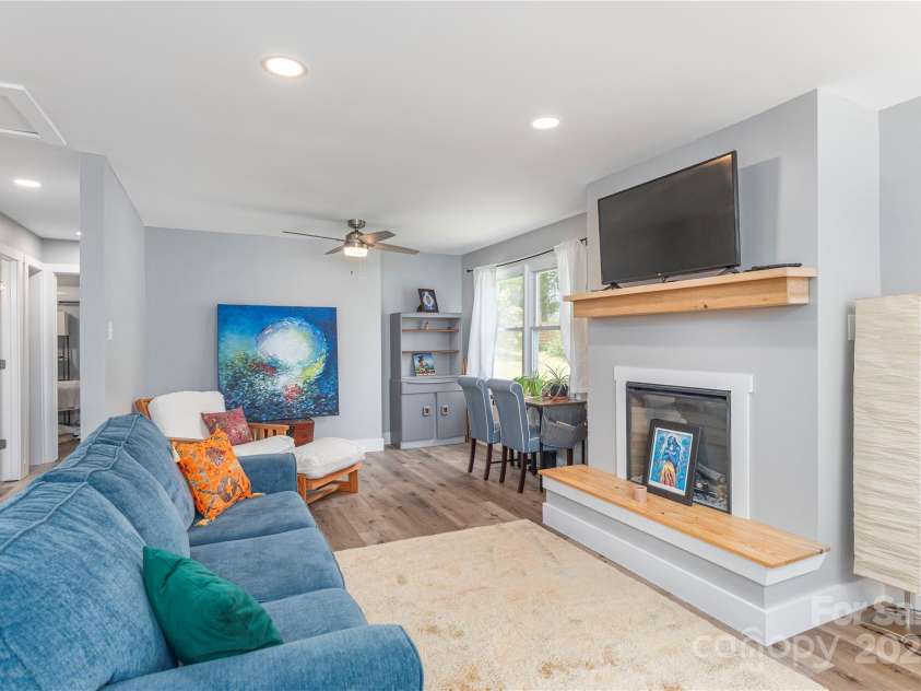 406 Melody Circle, Swannanoa, NC 28778.  MLS# CAR4273532, YatesRealty ID 22466. Fireplace in Open Living Area