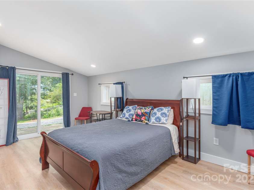 406 Melody Circle, Swannanoa, NC 28778.  MLS# CAR4273532, YatesRealty ID 22466. Primary Room with sliding door entrance