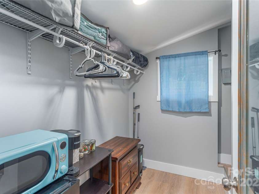 406 Melody Circle, Swannanoa, NC 28778.  MLS# CAR4273532, YatesRealty ID 22466. Walk in closet area set up for STR's