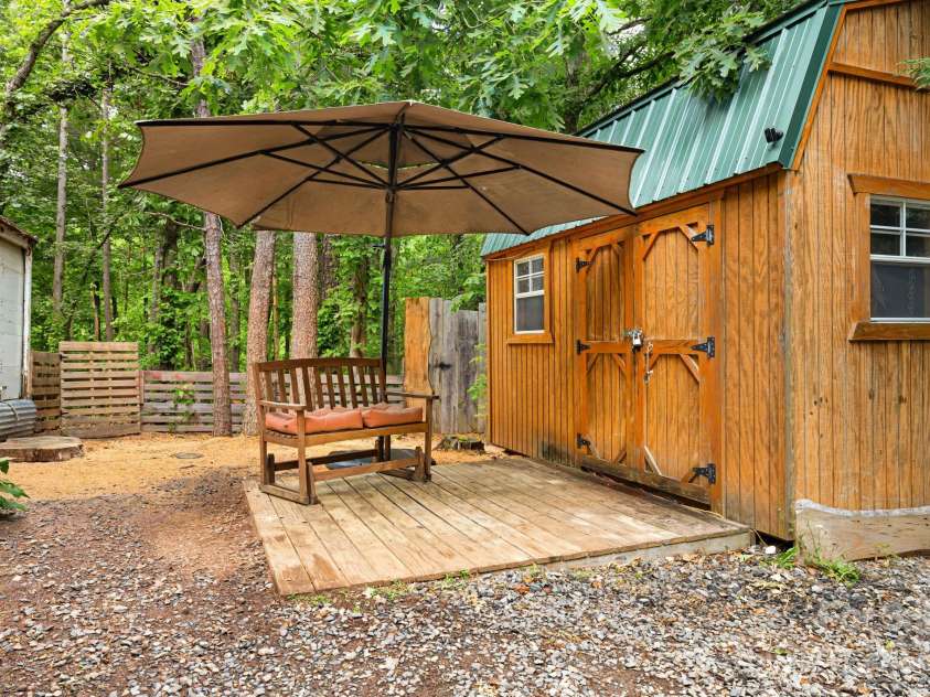 15 Robin Lane, Asheville, NC 28806.  MLS# CAR4254929, YatesRealty ID 22472. Workshop Shed and patio