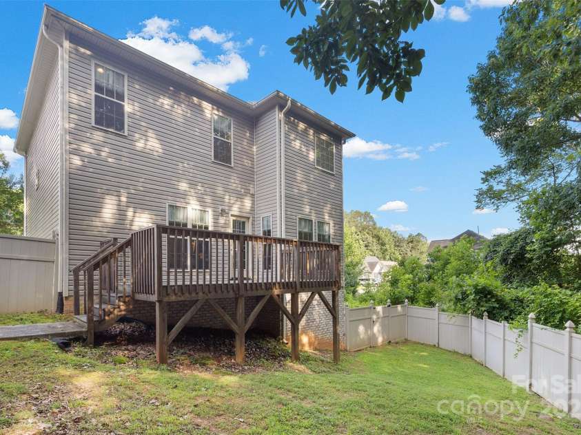 2953 Cameron Village Court, Winston Salem, NC 27103.  MLS# CAR4273768, YatesRealty ID 22475. Completely fenced yard with deck