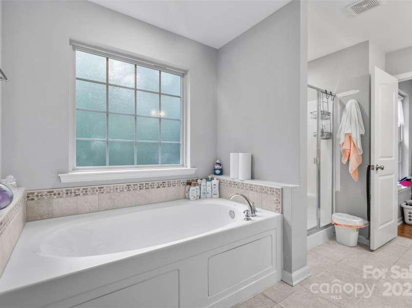 2953 Cameron Village Court, Winston Salem, NC 27103.  MLS# CAR4273768, YatesRealty ID 22475. Spa style primary BR
