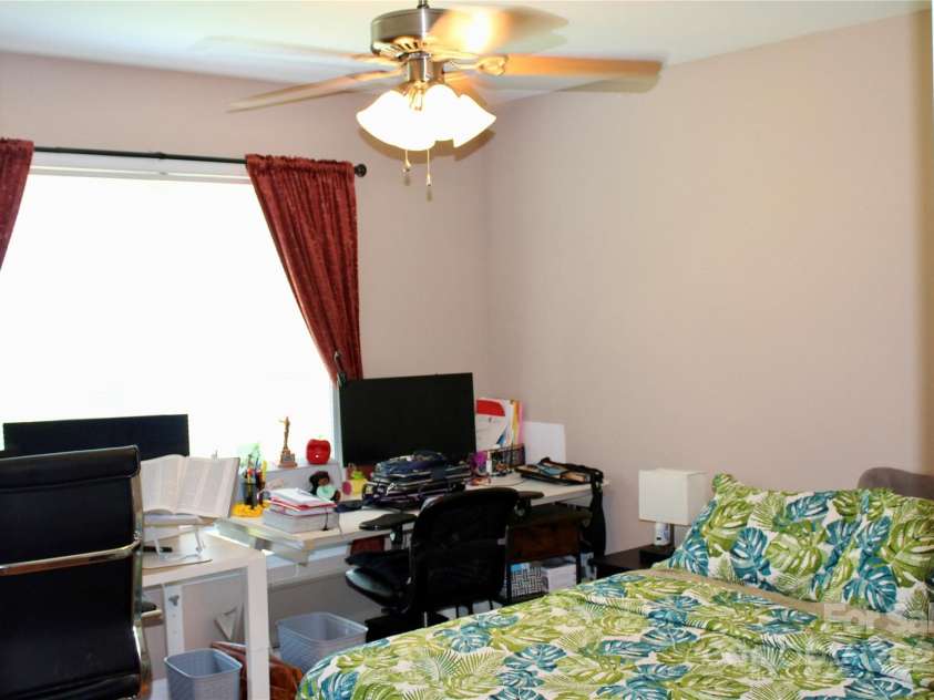 50 Duncan Road, Flat Rock, NC 28731.  MLS# CAR4274079, YatesRealty ID 22481. 2nd bedroom photo from adjacent duplex