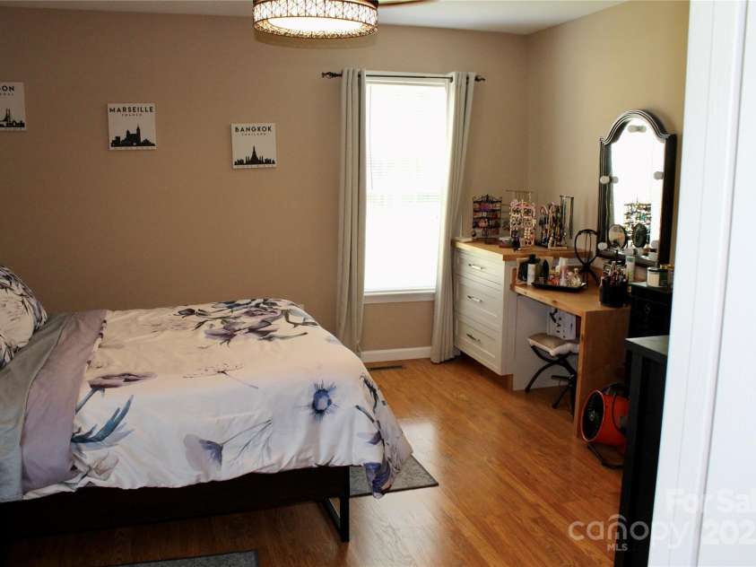 50 Duncan Road, Flat Rock, NC 28731.  MLS# CAR4274079, YatesRealty ID 22481. Primary bedroom photo from adjacent duplex
