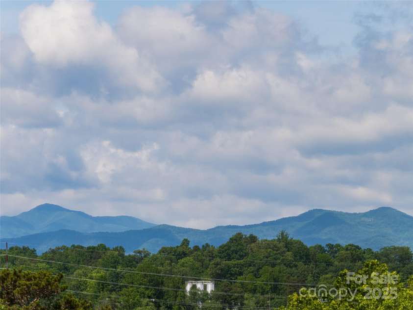 4506 Breakers Lane, Asheville, NC 28806.  MLS# CAR4273310, YatesRealty ID 22485. One feature you'll really like here are the wonderful views of the outdoors from inside, thanks to the large, open floor plan. You will definitely never want to leave home again with views throughout the open floor plan