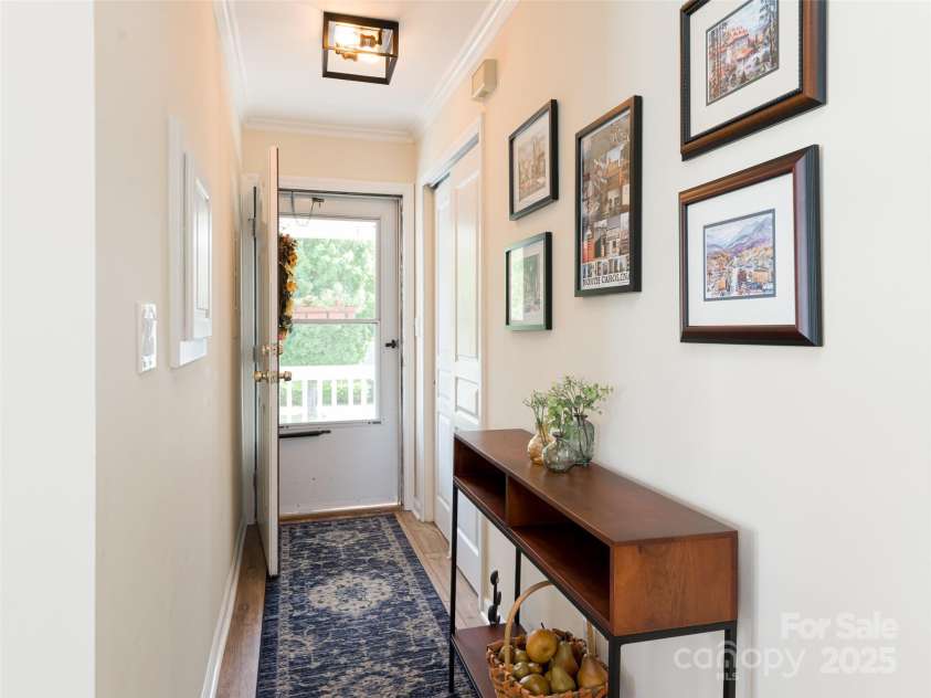 4506 Breakers Lane, Asheville, NC 28806.  MLS# CAR4273310, YatesRealty ID 22485. The front entrance has a coat closet and features plenty of natural lighting.