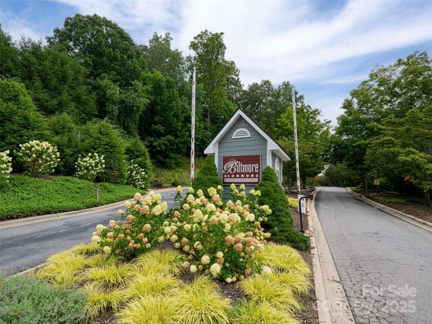 4506 Breakers Lane, Asheville, NC 28806.  MLS# CAR4273310, YatesRealty ID 22485. This home offers a welcoming entryway with gates to give you and your family the utmost peace of mind and extra security.