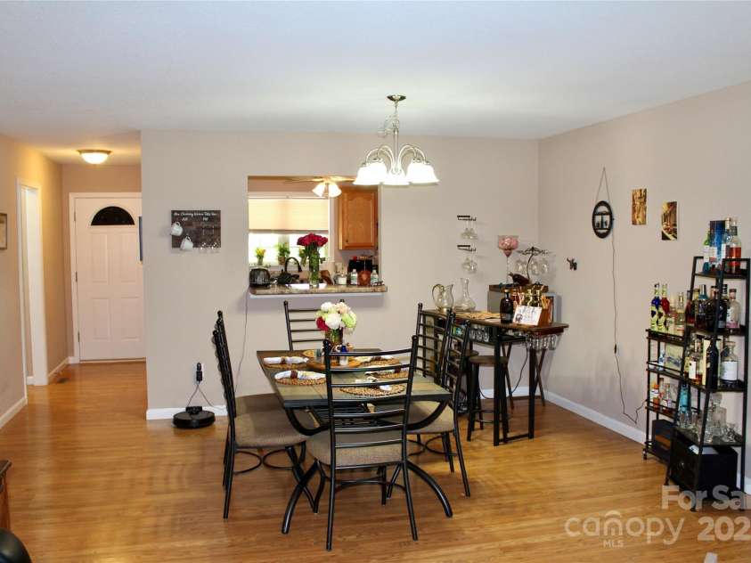 34 Duncan Road, Flat Rock, NC 28731.  MLS# CAR4275831, YatesRealty ID 22487. Large great room dining area