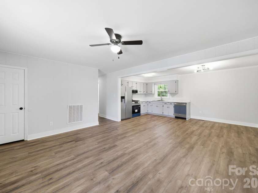 661 Kilborne Drive, Gastonia, NC 28052.  MLS# CAR4363337, YatesRealty ID 22487. Living Room looking into Kitchen and Dining Areas 
