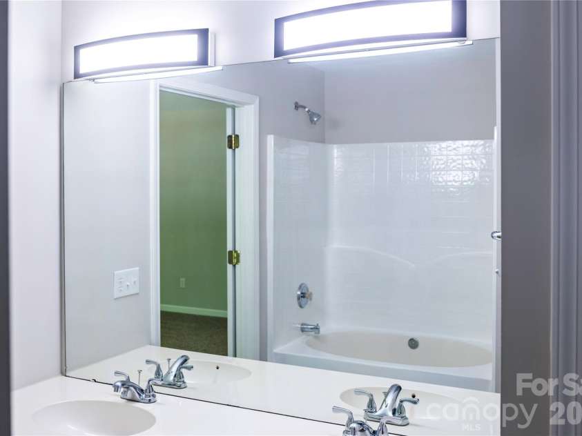 7519 Eurostar Drive, Charlotte, NC 28213.  MLS# CAR4368491, YatesRealty ID 22489. His & Hers sinks in Master Bath