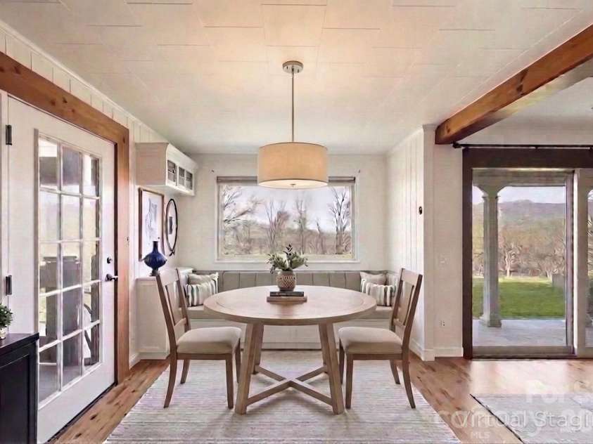 1032 Brightwater Drive, Hendersonville, NC 28739.  MLS# CAR4361176, YatesRealty ID 22490. Dining area virtually staged