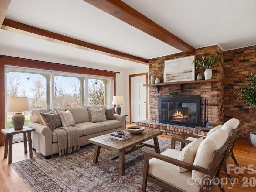 1032 Brightwater Drive, Hendersonville, NC 28739.  MLS# CAR4361176, YatesRealty ID 22490. Living room virtually staged