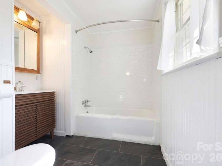 1032 Brightwater Drive, Hendersonville, NC 28739.  MLS# CAR4361176, YatesRealty ID 22490. Second bathroom partially remodeled