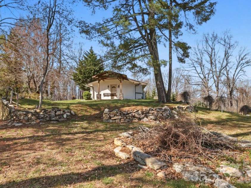 1032 Brightwater Drive, Hendersonville, NC 28739.  MLS# CAR4361176, YatesRealty ID 22490. View from the side yard