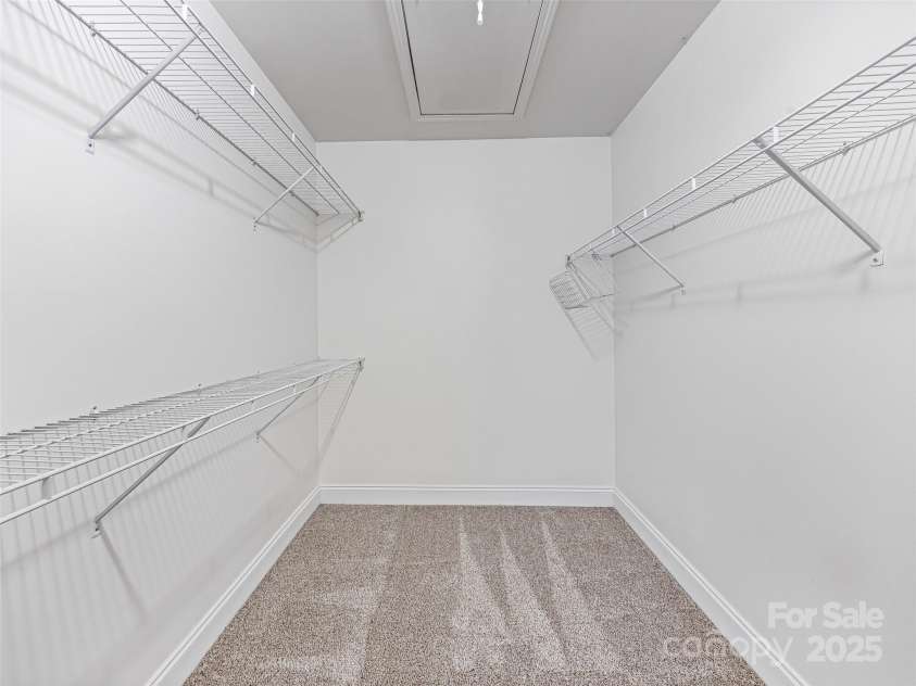 12 Whitleigh Court, Arden, NC 28704.  MLS# CAR4275811, YatesRealty ID 22492. Large walk in closet in Primary Bath