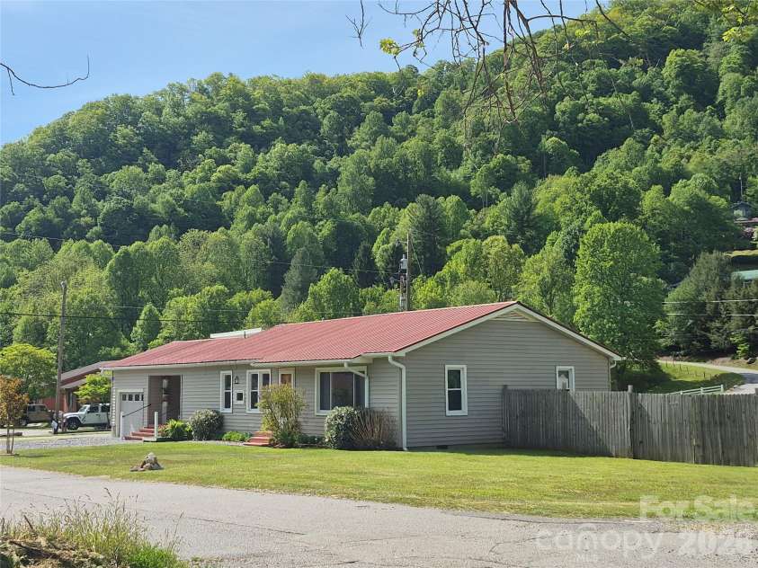 5 Gibson Drive, Maggie Valley, NC 28751.  MLS# CAR4379068, YatesRealty ID 22492. Mountains all around
