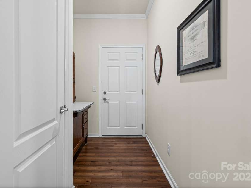 673 Birchway Drive, Fort Mill, SC 29715.  MLS# CAR4313629, YatesRealty ID 22493. Hallway to Garage.