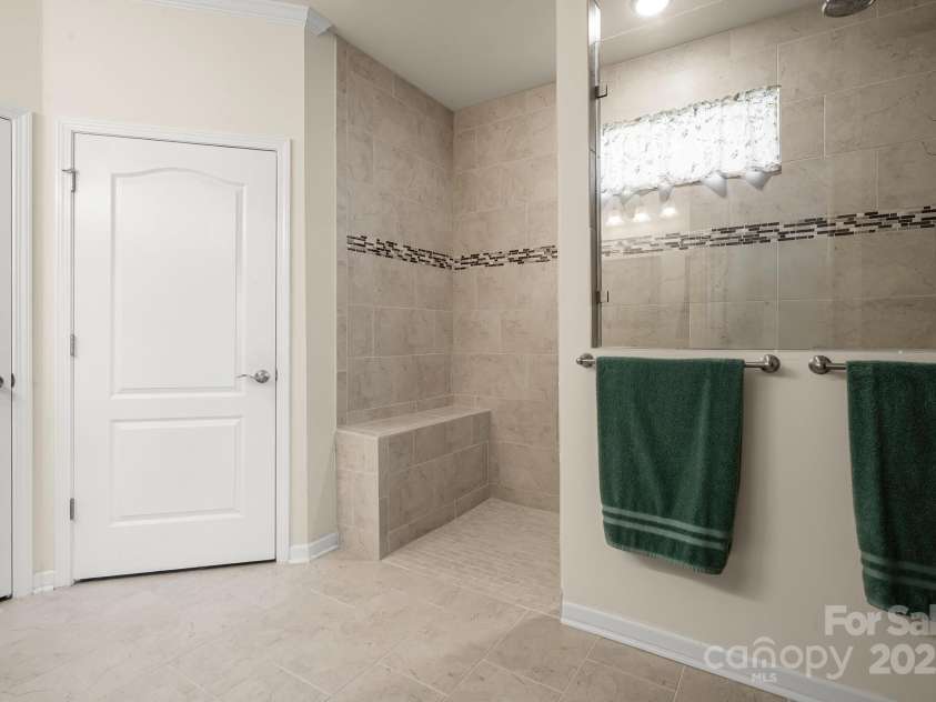 673 Birchway Drive, Fort Mill, SC 29715.  MLS# CAR4313629, YatesRealty ID 22493. Primary Bath walk-in shower.