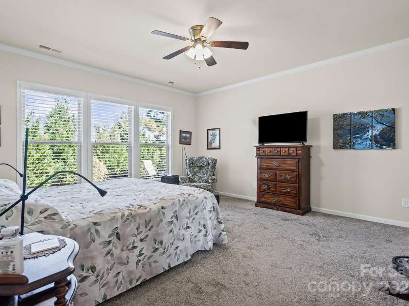 673 Birchway Drive, Fort Mill, SC 29715.  MLS# CAR4313629, YatesRealty ID 22493. Primary Bedroom overlooks private back yard.