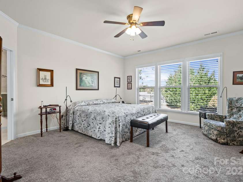 673 Birchway Drive, Fort Mill, SC 29715.  MLS# CAR4313629, YatesRealty ID 22493. Primary Bedroom with ceiling fan.
