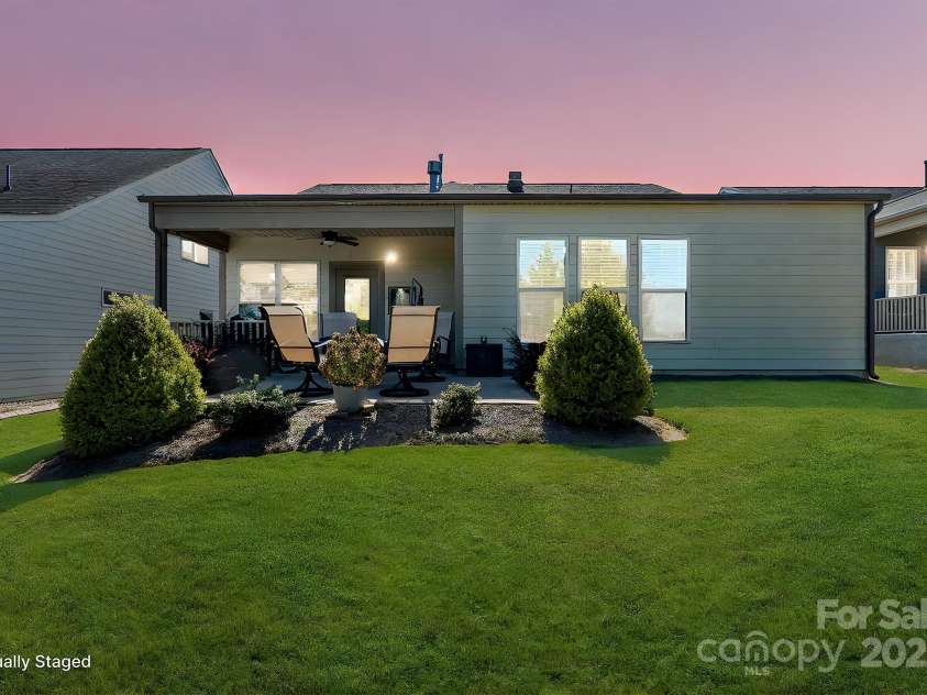673 Birchway Drive, Fort Mill, SC 29715.  MLS# CAR4313629, YatesRealty ID 22493. Twilight view of back yard.