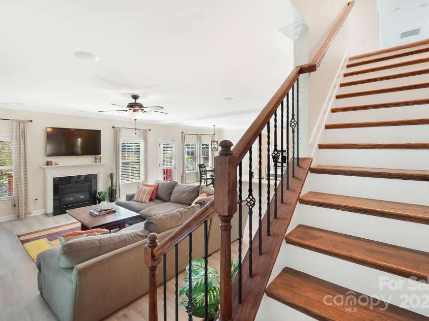4009 Oxford Mill Road, Waxhaw, NC 28173.  MLS# CAR4267673, YatesRealty ID 22496. Hardwood floor stairs