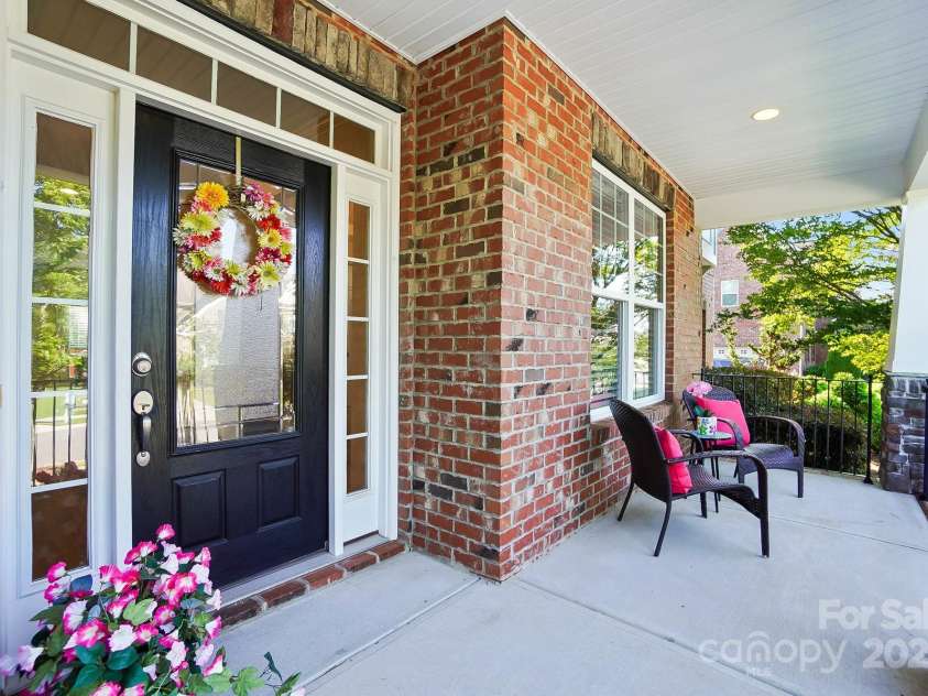 4009 Oxford Mill Road, Waxhaw, NC 28173.  MLS# CAR4267673, YatesRealty ID 22496. Rocking Chair Front Porch