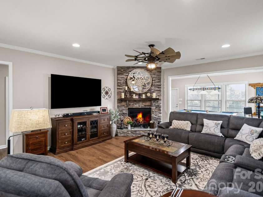 685 Birchway Drive, Fort Mill, SC 29715.  MLS# CAR4356947, YatesRealty ID 22497. Great Room / Stone Fireplace w/raised hearth