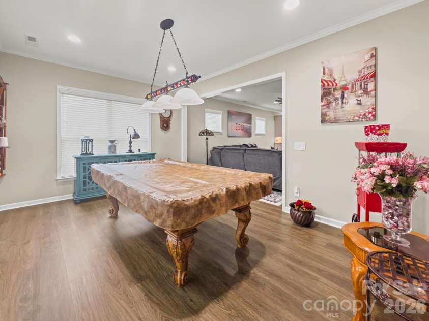 685 Birchway Drive, Fort Mill, SC 29715.  MLS# CAR4356947, YatesRealty ID 22497. Sunroom shown with pool table