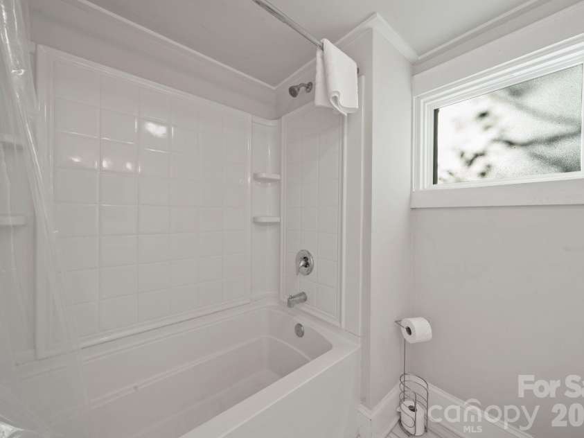 3720 Tuckaseegee Road, Charlotte, NC 28208.  MLS# CAR4356848, YatesRealty ID 22498. Basement: Full Bathroom with tub. 