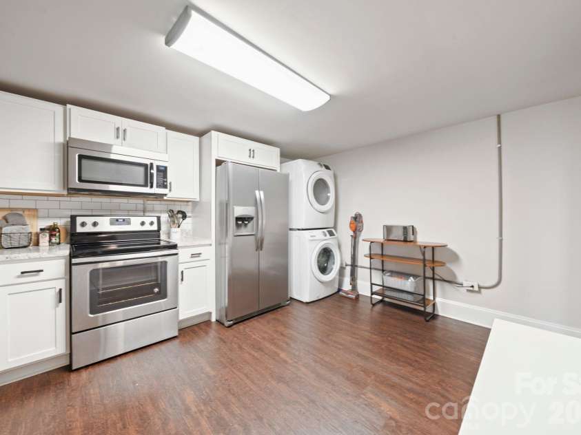 3720 Tuckaseegee Road, Charlotte, NC 28208.  MLS# CAR4356848, YatesRealty ID 22498. Basement: Kitchen, newer appliances throughout.