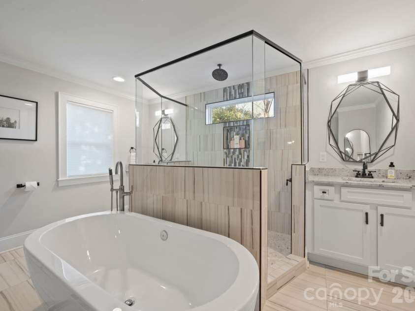 3720 Tuckaseegee Road, Charlotte, NC 28208.  MLS# CAR4356848, YatesRealty ID 22498. Deep soaking tub.