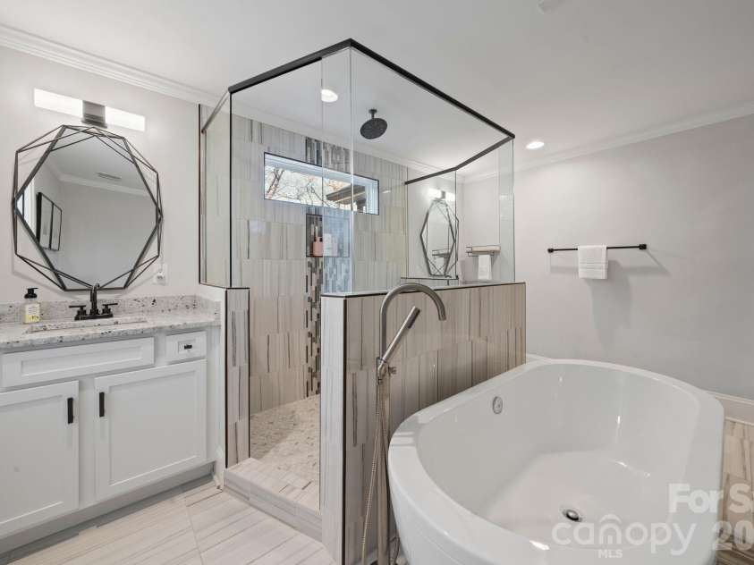 3720 Tuckaseegee Road, Charlotte, NC 28208.  MLS# CAR4356848, YatesRealty ID 22498. Walk in shower with rain head shower. 