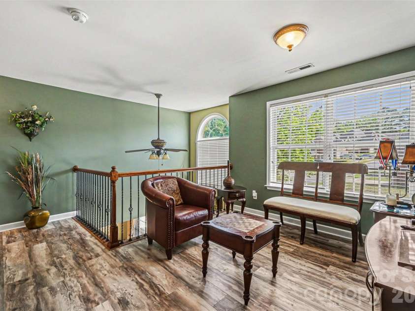 10812 Clark Street, Davidson, NC 28036.  MLS# CAR4372987, YatesRealty ID 22506. Loft area for more hangout space