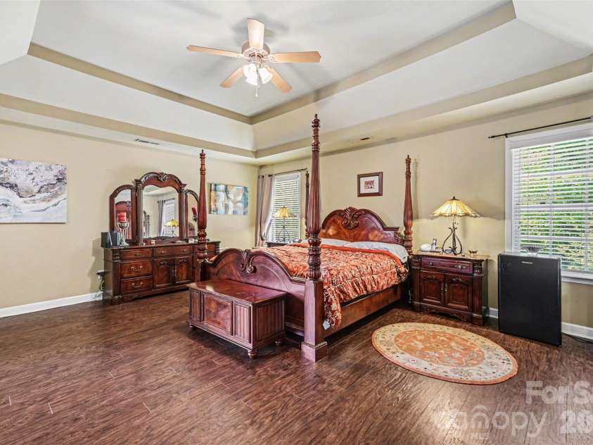 10812 Clark Street, Davidson, NC 28036.  MLS# CAR4372987, YatesRealty ID 22506. Primary bedroom on upper level with trey ceiling