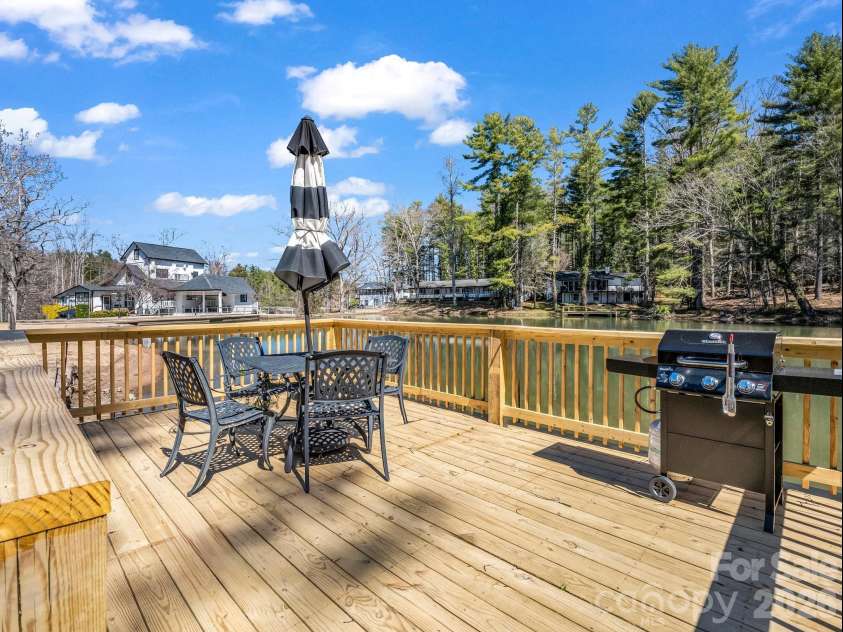 140 Old Mill Road, Flat Rock, NC 28731.  MLS# CAR4373085, YatesRealty ID 22508. Shared deck with grill
