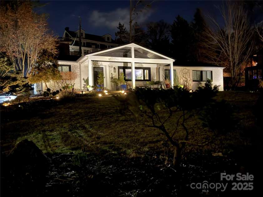 50 Midland Drive, Asheville, NC 28804.  MLS# CAR4223405, YatesRealty ID 2251. Evening at 50 Midland w/landscape lights
