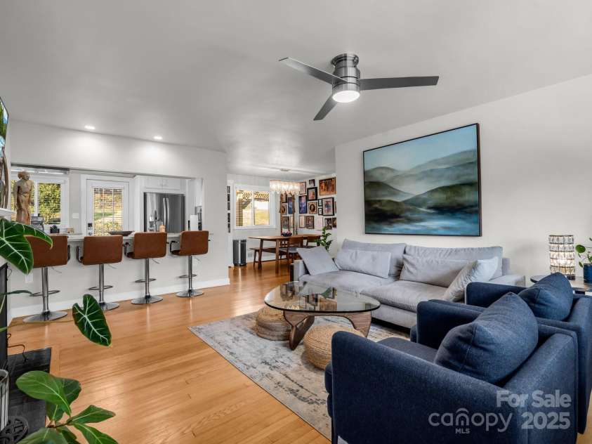 50 Midland Drive, Asheville, NC 28804.  MLS# CAR4223405, YatesRealty ID 2251. Family Room & Breakfast/Bar Area allows for easy conversation w/guests & family. Chairs may be moved to allow for open buffet for entertaining