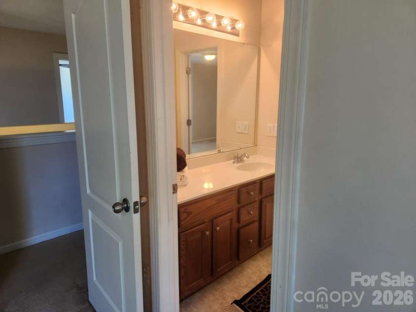 10118 Alvarado Way, Charlotte, NC 28277.  MLS# CAR4378815, YatesRealty ID 22515. View From Fourth Bedroom into Bath