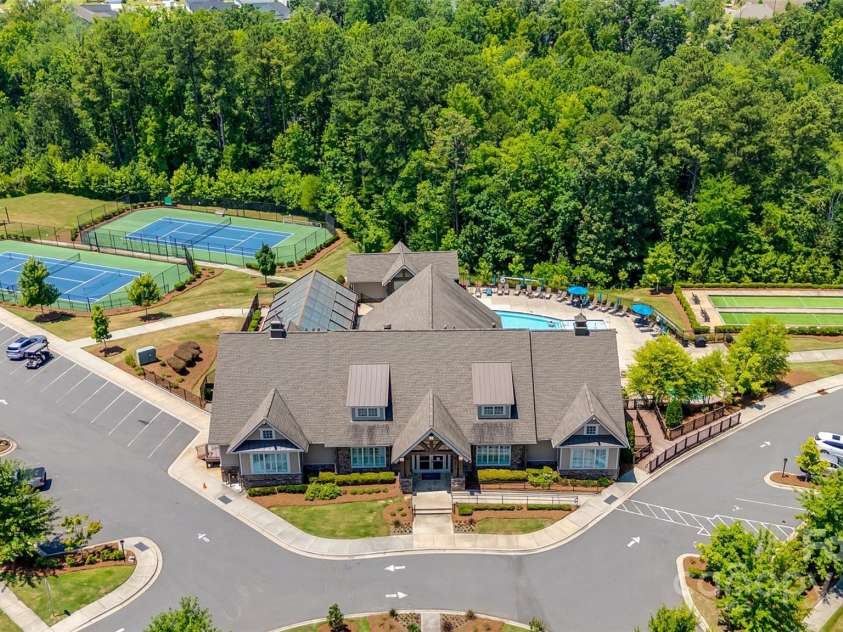 15620 Lake Ridge Road, Charlotte, NC 28278.  MLS# CAR4238155, YatesRealty ID 22515. Just a short stroll from your doorstep, the clubhouse offers an array of amenities designed to enhance your lifestyle. Imagine enjoying a dip in the pool on a sunny day, working out in the fully equipped gym, or gath
