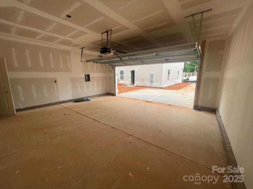 4017 Grommet Court, Matthews, NC 28105.  MLS# CAR4253909, YatesRealty ID 22516. 2 car detached rear load garage