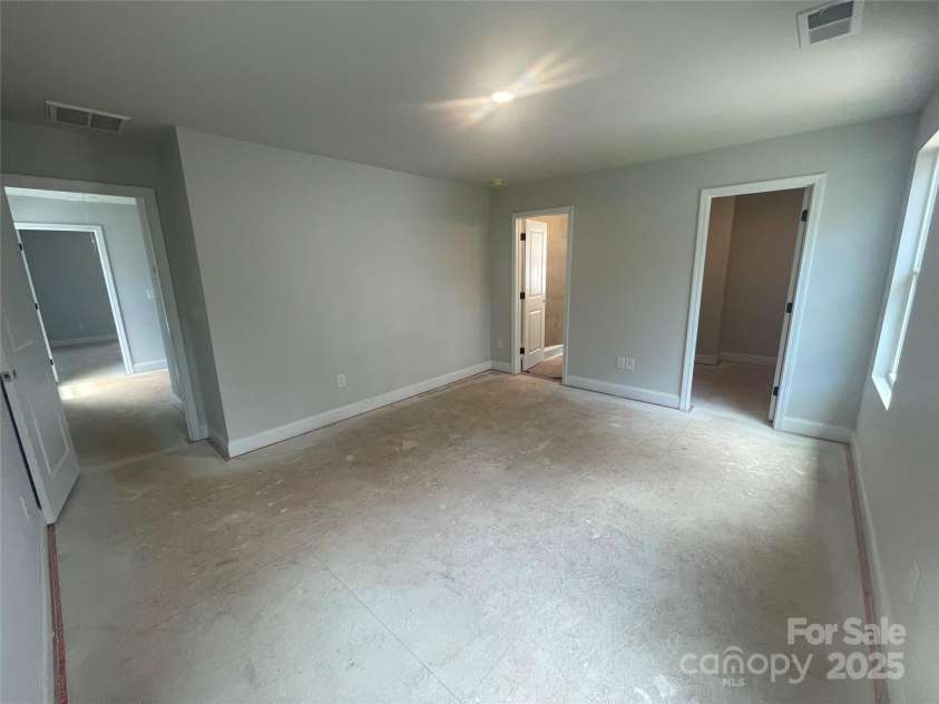 4017 Grommet Court, Matthews, NC 28105.  MLS# CAR4253909, YatesRealty ID 22516. 2nd Floor Primary Bedroom off the back of the home for ultimate privacy and quiet