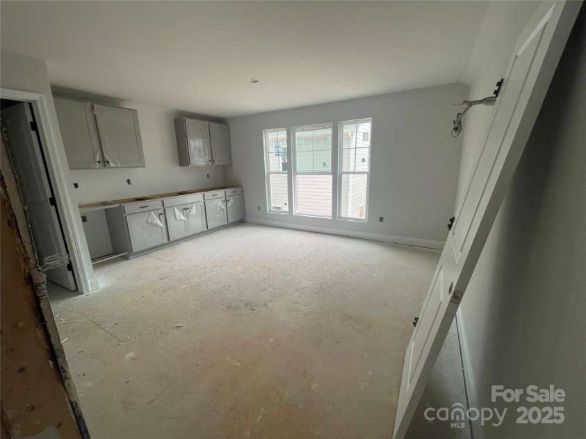 4017 Grommet Court, Matthews, NC 28105.  MLS# CAR4253909, YatesRealty ID 22516. Above garage studio with full bath, walk in closet and separate entrance