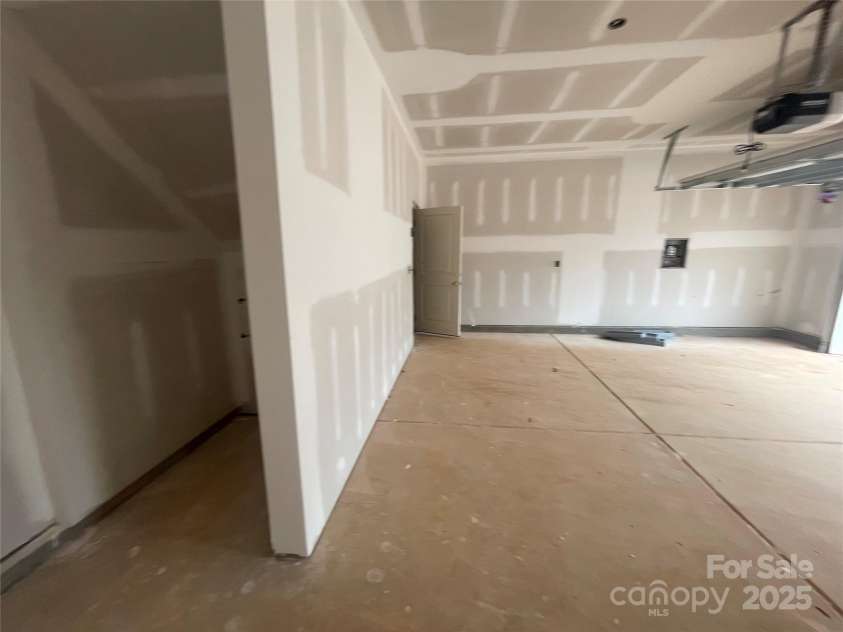 4017 Grommet Court, Matthews, NC 28105.  MLS# CAR4253909, YatesRealty ID 22516. Oversized garage with separate storage space