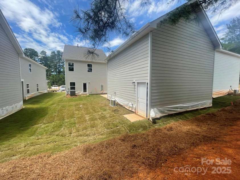 4017 Grommet Court, Matthews, NC 28105.  MLS# CAR4253909, YatesRealty ID 22516. Rear Yard View